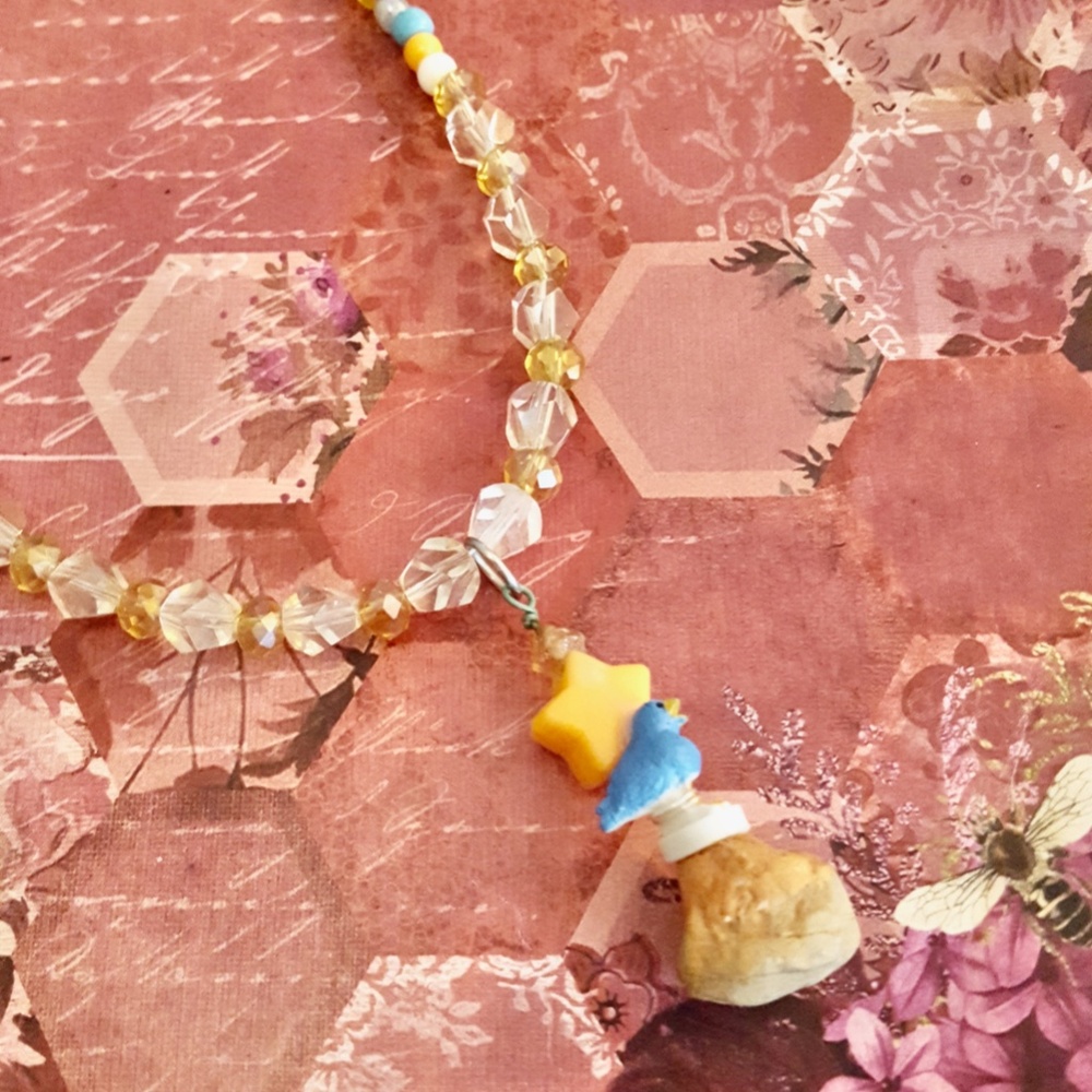 Trendmasters Blue Bird on Rock Star Pendant White, Orange, Blue Beaded Necklace